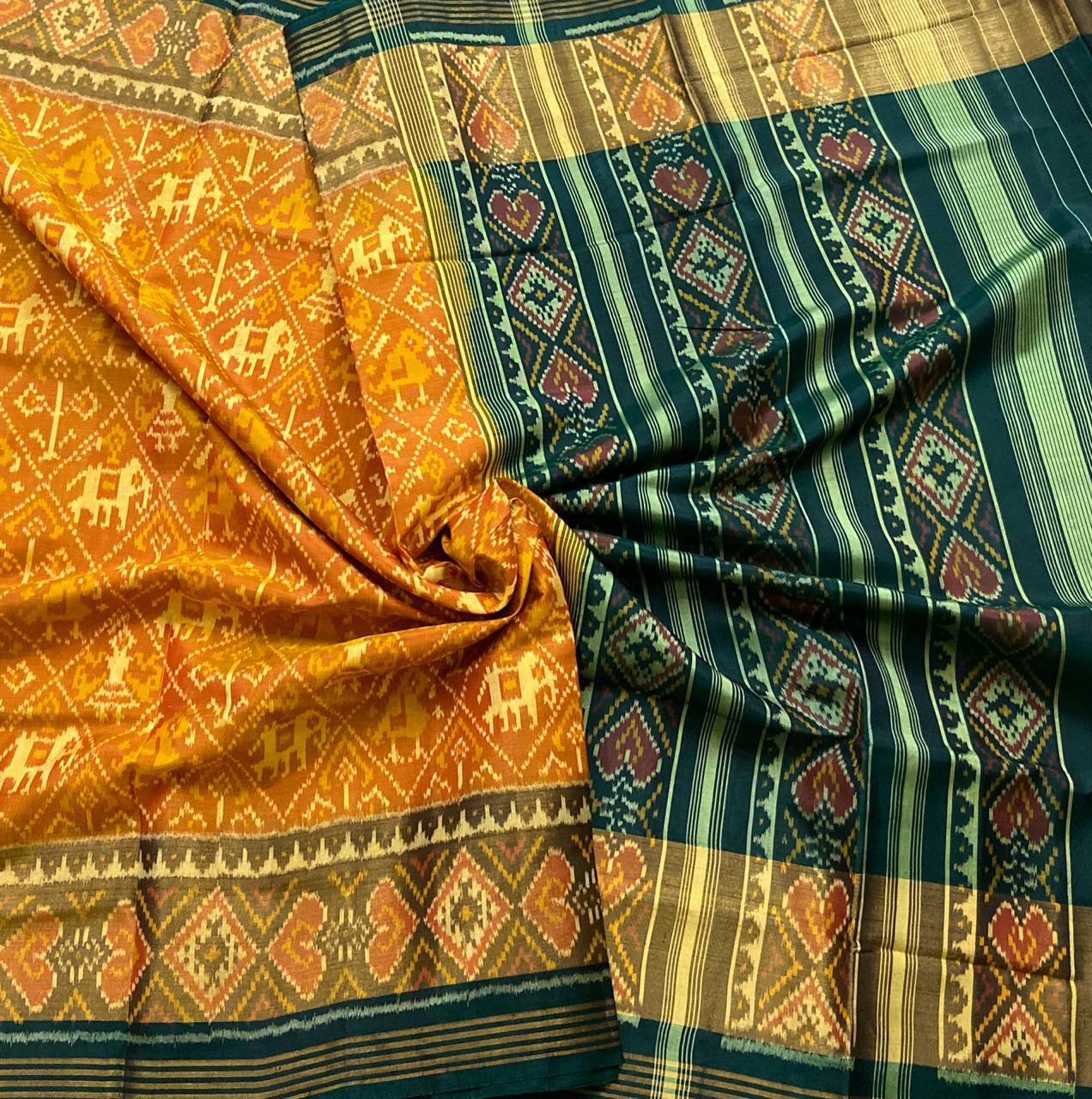 Buy Dark Green Patola Silk Sari Online in USA |Embroidered Zari Border –  Pure Elegance